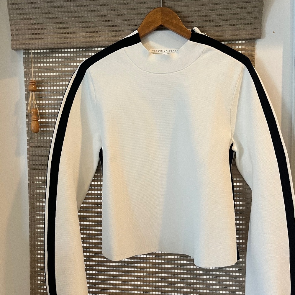 Victoria Beard white cropped sweater with black stripes on sleeves
